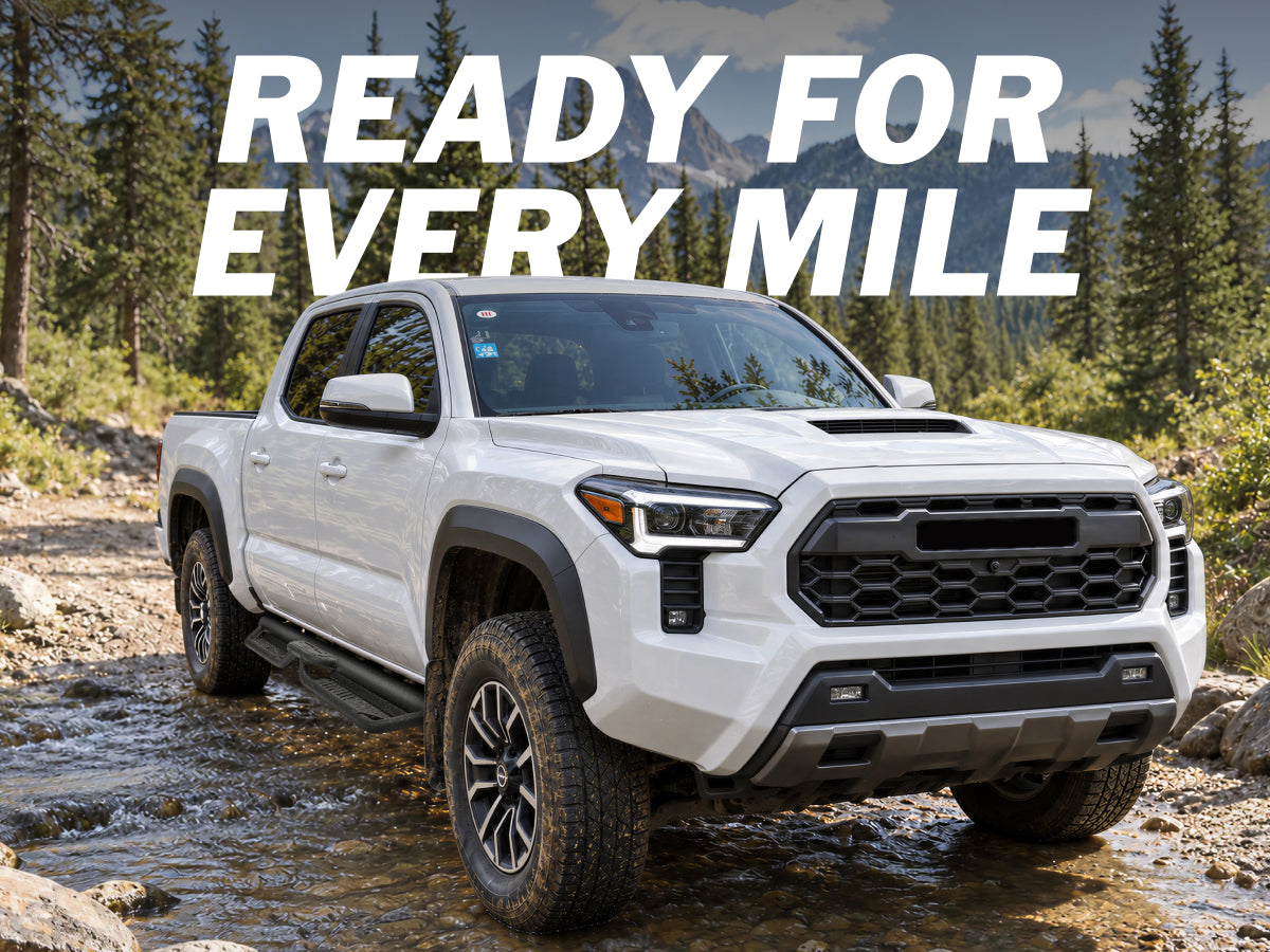 Dual-tube running boards, side view on 4th-Gen Toyota Tacoma